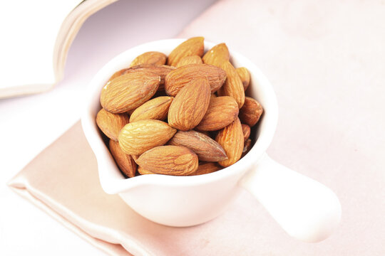 Peeled Almonds in Hand - Healthy Snack Kernels