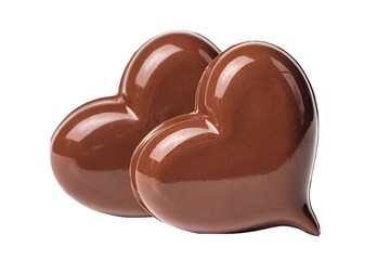 Obraz premium Delicious heart shaped dark and milk chocolate candies isolated on white background make a tasty gourmet sweet snack or a romantic Valentine gift made of cocoa and sugar