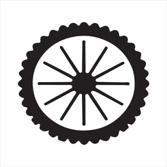 Black and white of a spoked wheel with a scalloped outer edge
