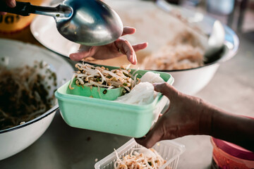 volunteers give food to local poor people, Feeding the poor Help them relieve hunger