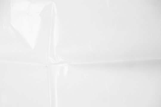 Plastic wrap transparent texture overlay effect. Polyethylene packaging of vinyl wrap or cd cover. Shrink crumpled plastic bag sleeve, package mockup illustration