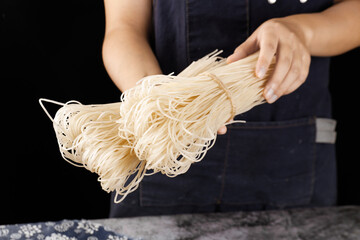 Handmade Vermicelli Noodles - Chef Holding Fresh Artisanal Pasta
