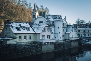 View of Alzette River, from B&eacute;inchen Br&eacute;ck Bridge, Pafendall, Luxembourg, Pfaffenthal. Snow covered scenery. January 2nd, 2026.