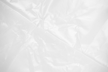 Abstract white plastic wrap texture. Transparent surface, glossy effect plastic.