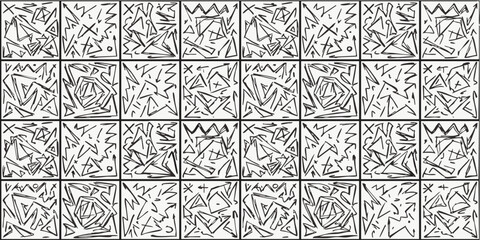 Intricate black and white geometric pattern with repeating floral designs viewed from directly above