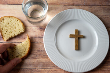 Christian Fasting With Bread And Cross