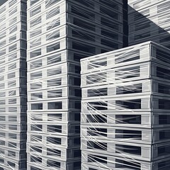Stacked Pallets Ready for Shipping and Distribution in Warehouse.