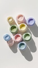 Colorful cosmetic jars, various shades