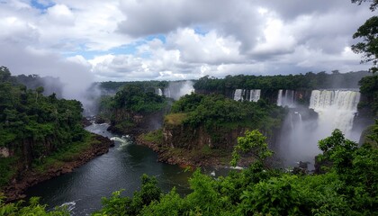 Awe-Inspiring Panoramic View of Majestic Waterfalls Cascading Through a Lush Green Tropical Landscape Under a Dynamic Cloudy Sky, Showcasing Nature's Untamed Power and Breathtaking Beauty