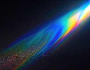 A diagonal beam of light refracts, creating a spectral rainbow effect
