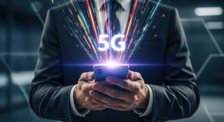 Business professional holding smartphone with vibrant 5G graphics emerging, showcasing modern technology and connectivity in a dynamic environment