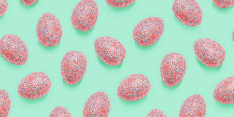Sparkling easter eggs as creative pattern on pastel mint color. Minimal style contemporary banner, abstract aesthetic food. Pink eggs with rhinestones or sequins as easter spring holidays background.