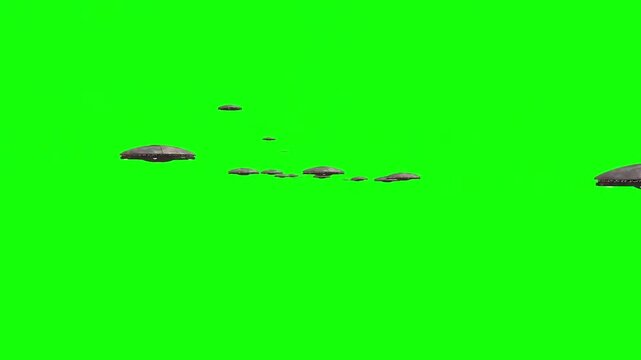 Green Screen Chroma Key loop of alien spaceships flying in formation for futuristi 4K video footage.