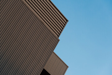 brown metal wall for architecture background with blue sky