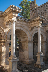 Hadrian Gate, also known as the Uc Kapilar, at the entrance to Antalya Old Town or Kaleici on a...
