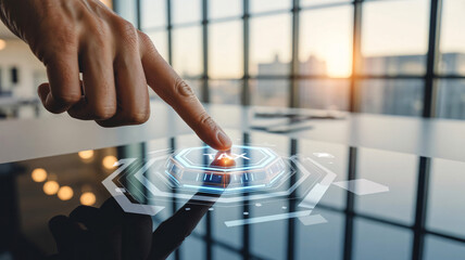 A person's hand interacting with a futuristic digital interface in a modern office space during sunset