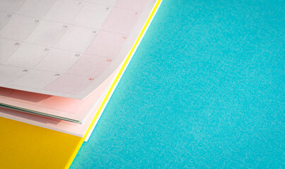 Close-up of Calendar on Blue Background