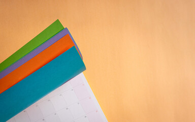 Close-up of Colorful Calendars on Table