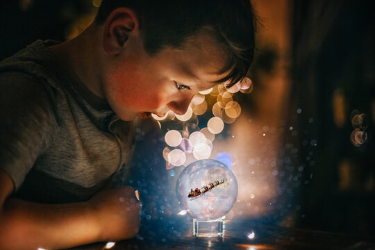 Boy Looking into Magic Ball