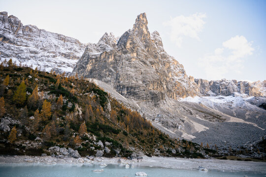 Lake Sorapis turquoise water with dramatic Dolomites mountain peak