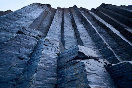 Dwarfed by Tall Walls in Studlagil Canyon