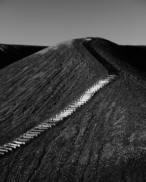 Black and White Hillside with Steps of Hiking Trail Zigzagging