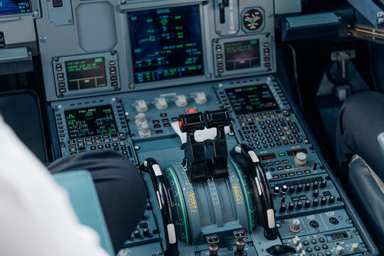 Close-up of aircraft throttle and control panel