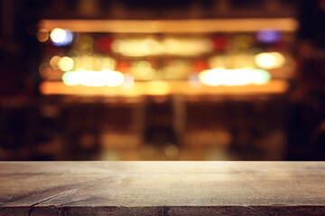 table and lights background during night time. Product display or mockup