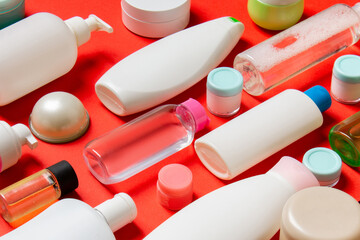 Group of plastic bodycare bottle Flat lay composition with cosmetic products on colored background empty space for you design. Set of White Cosmetic containers, top view with copy space