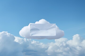 Envelope emerging from a cloud against a blue sky, symbolizing digital communication
