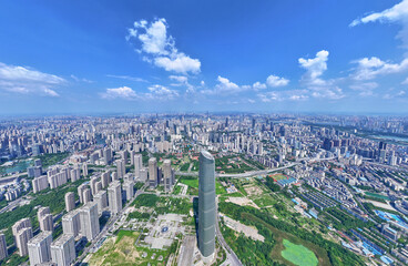 Wuhan City Skyline Aerial View with Green Spaces and Urban Development © TranPhuoc