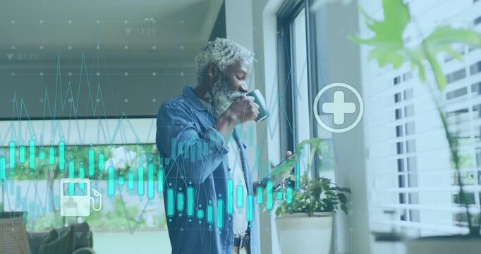 Animation of graphs, icons, senior african american man scrolling on cellphone while drinking coffee