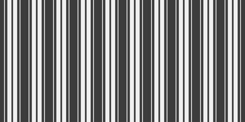 Obraz premium Sleek monochrome vertical stripes create a dynamic, modern background.