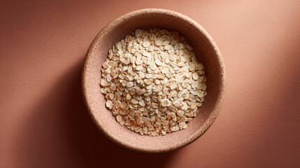 Warm Taupe Background with Simple Bowl of Oats