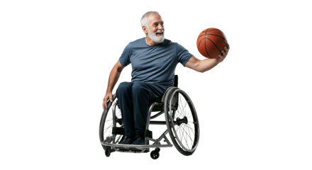 A man in a wheelchair playing basketball with an expression of determination and joy