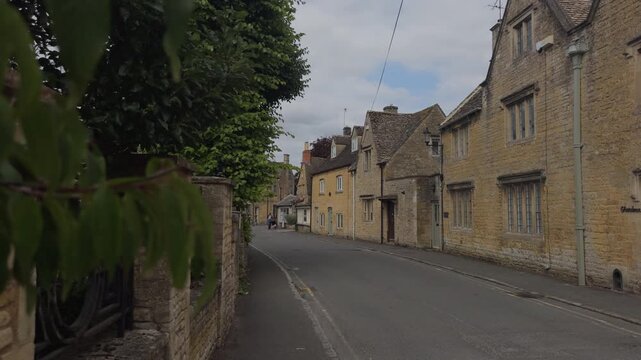 Strolling the famous stone streets of Bourton-on-the-Water, Cotswolds, England.