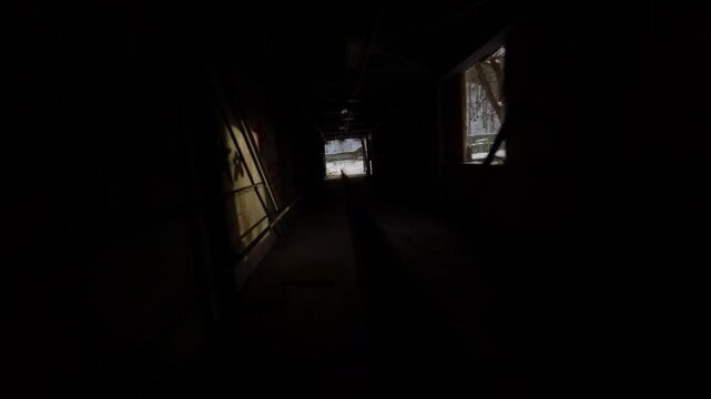 Fast fpv freestyle run through decaying machinery and broken walls inside abandoned factory complex, belgo factory shawinigan Montreal Canada