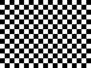 Fototapeta premium A black and white checkered pattern fills the entire frame of the image
