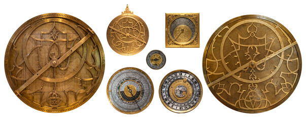 Collection of antique astrolabes and historical astronomical instruments isolated on white background. Armillary sphere, quadrant, planisphere, sundial, astronomical clock dials. © Tryfonov