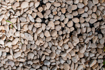 Abstract nature sea stones background. Gray rounded stones texture. Stone background. 