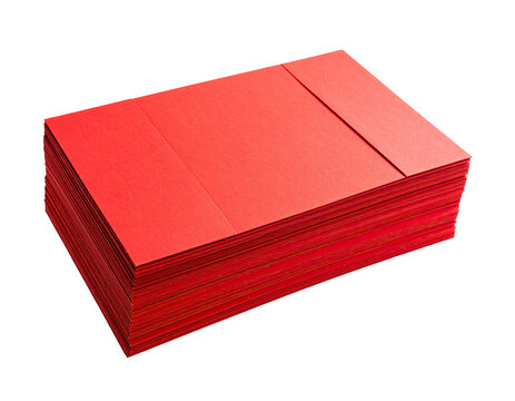 Close-up of a neat stack of vibrant red paper, showcasing texture and layered edges against black backdrop