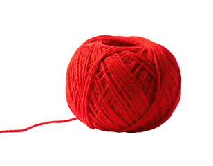 Close-up of a red ball of yarn isolated on a black background, shows intricate thread detail