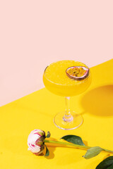 Passion fruit in glasses, alcoholic tropical cocktail