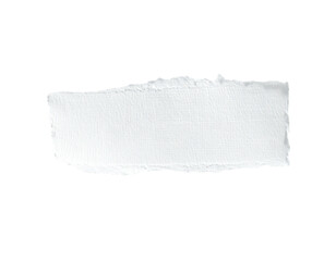 Obraz premium Close-up of a white paper fragment with torn edges against a black background
