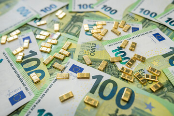 Stack of gold bars on euro banknotes representing wealth, fortune and long term financial growth