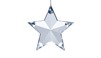 Hanging, faceted, crystal star ornament against a stark, black backdrop