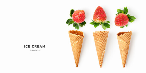 Ice cream elements isolated on white background. Minimalist composition with waffle cones and fresh strawberries