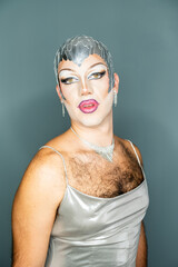 Latin Drag Queen Showcases Glamour and Talent in Vibrant Studio Setting