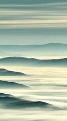Mountain ridges creating an abstract landscape with layers of deep morning fog