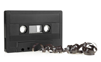 Black audio cassette tape isolated on a white background. Vintage compact audio cassette tape for magnetic recording.